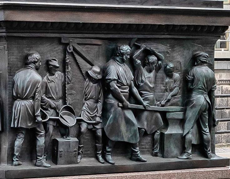 Bronzerelief mit Darstellung der Gieerei und Schmiede von August Borsig.